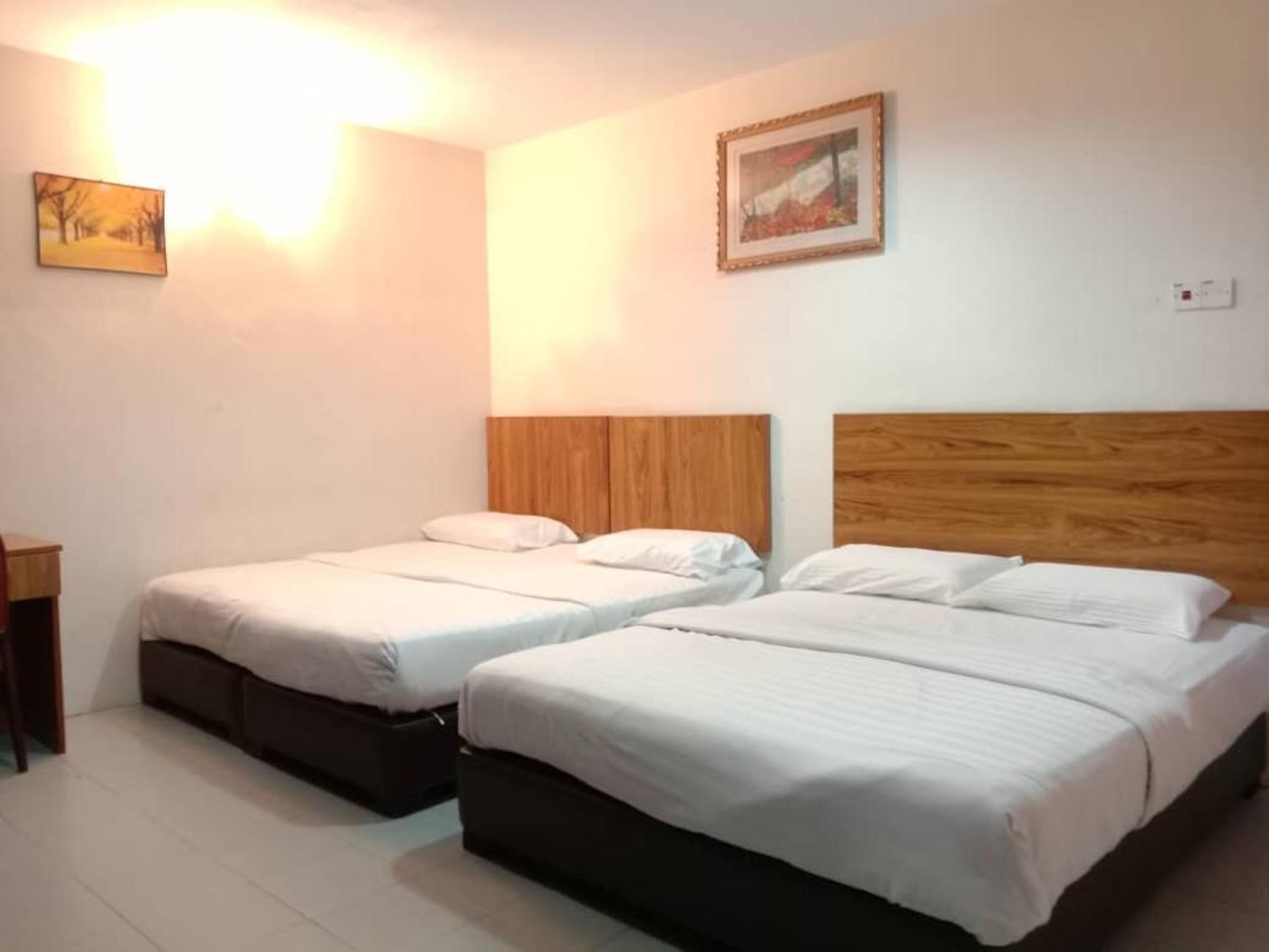 Oyo 89877 Sun Triang Hotel Kampong Kerayong Exterior photo
